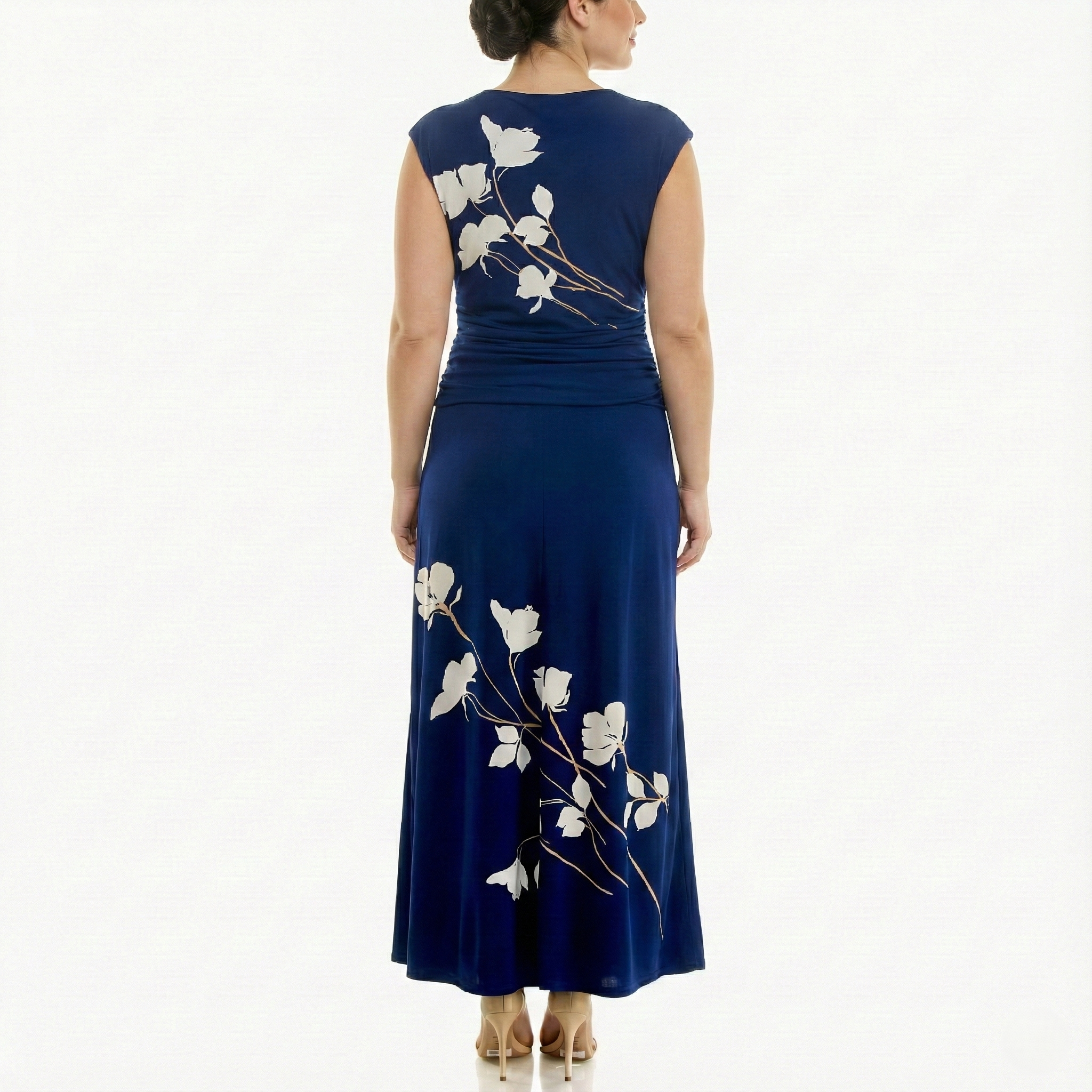 Back view of a women’s navy blue sleeveless maxi dress with ivory floral print, highlighting the straight column silhouette, smooth back, and floor-length skirt.